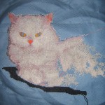 Процесс вышивки по фото "Кот Тимошка"